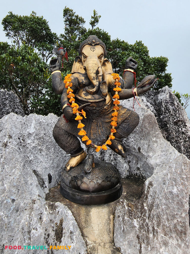 Hindu Ganesha statue graces one section of the temple on the summit